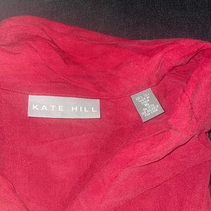 Red silk button down blouse in good condition !